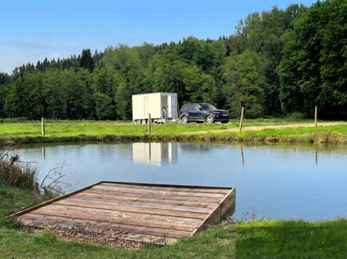 PremierPlus luxury toilet trailer at outdoor garden event